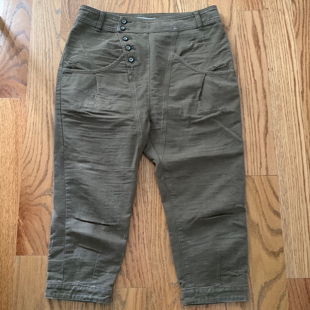 Free People cropped and distressed pants.